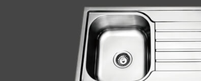 Pressing kitchen sinks